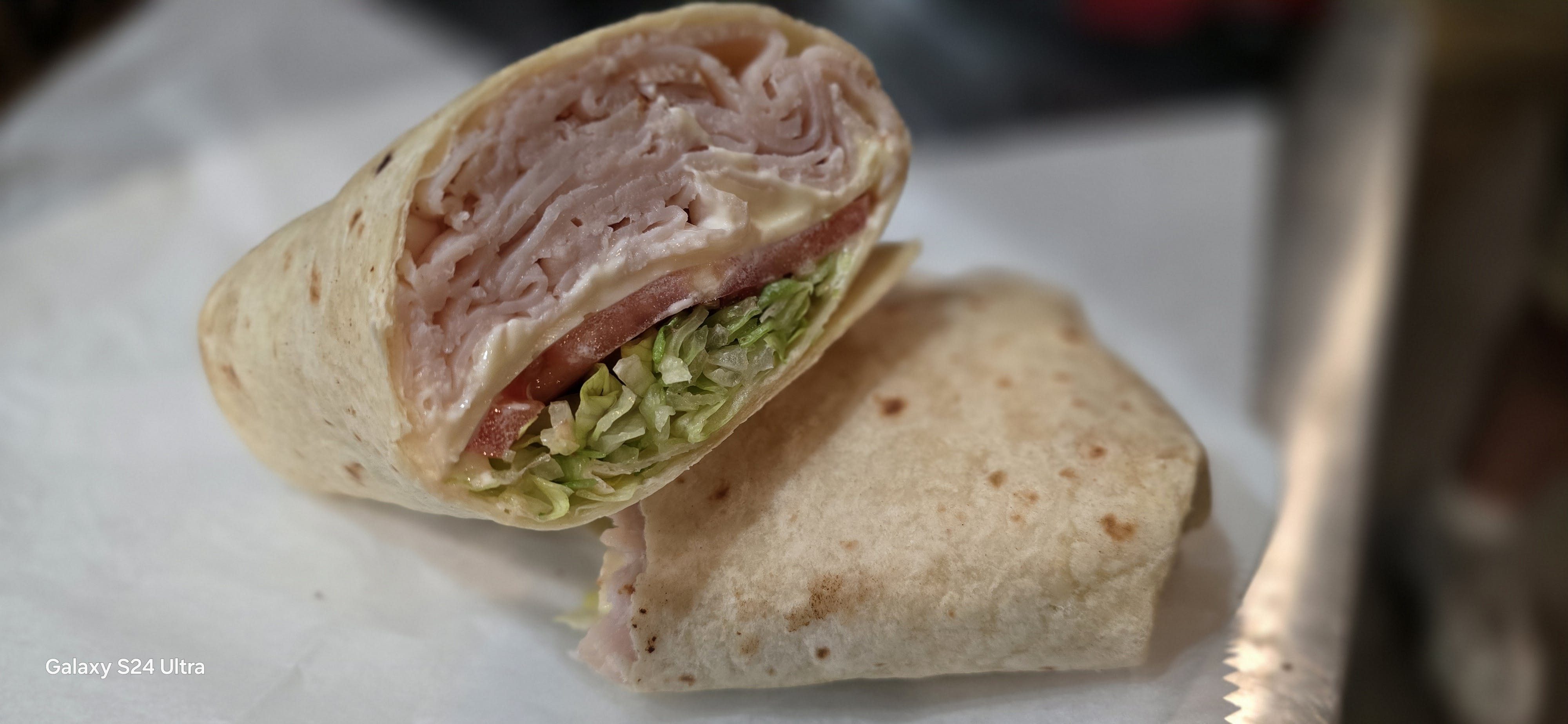 Turkey Wrap Served with Fries.