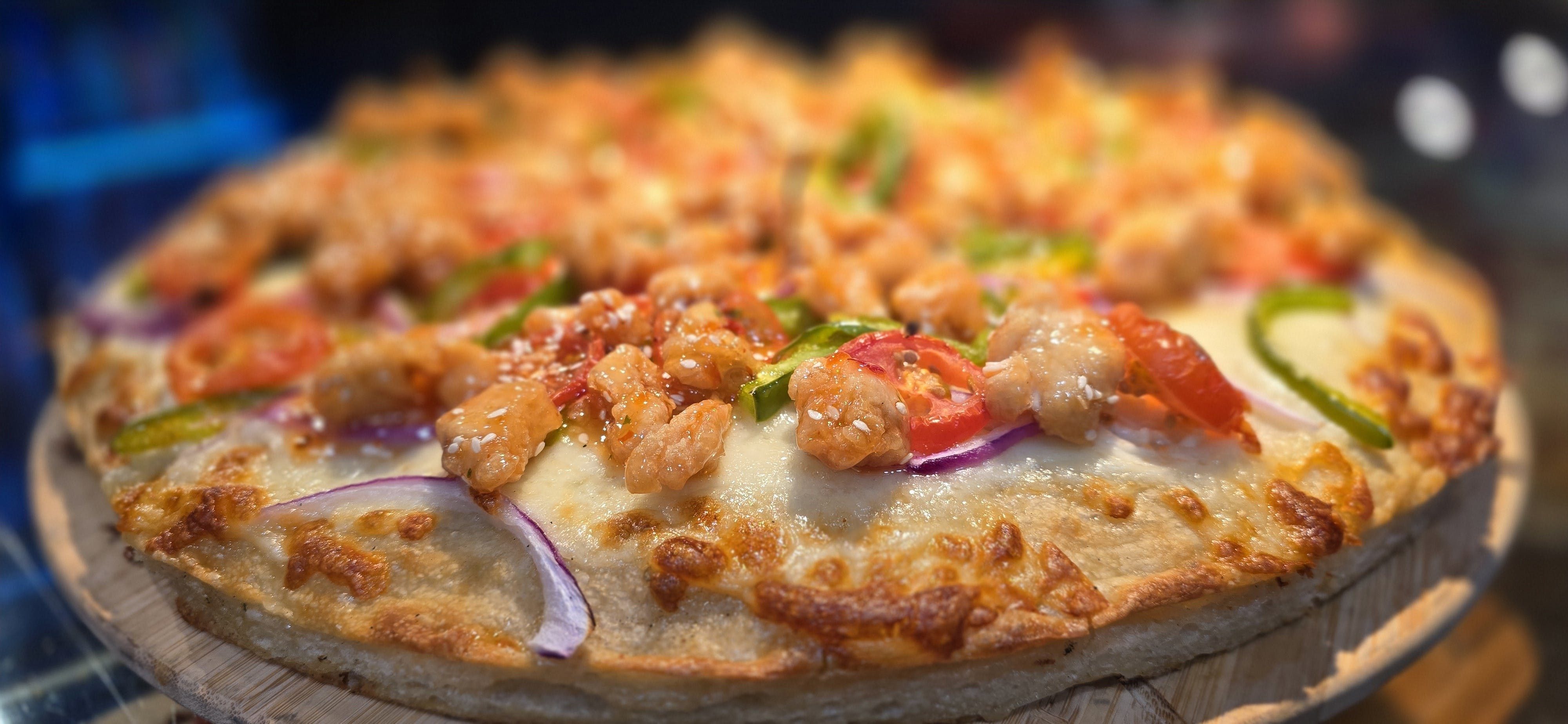 Sesame Chicken Chilie Pizza.