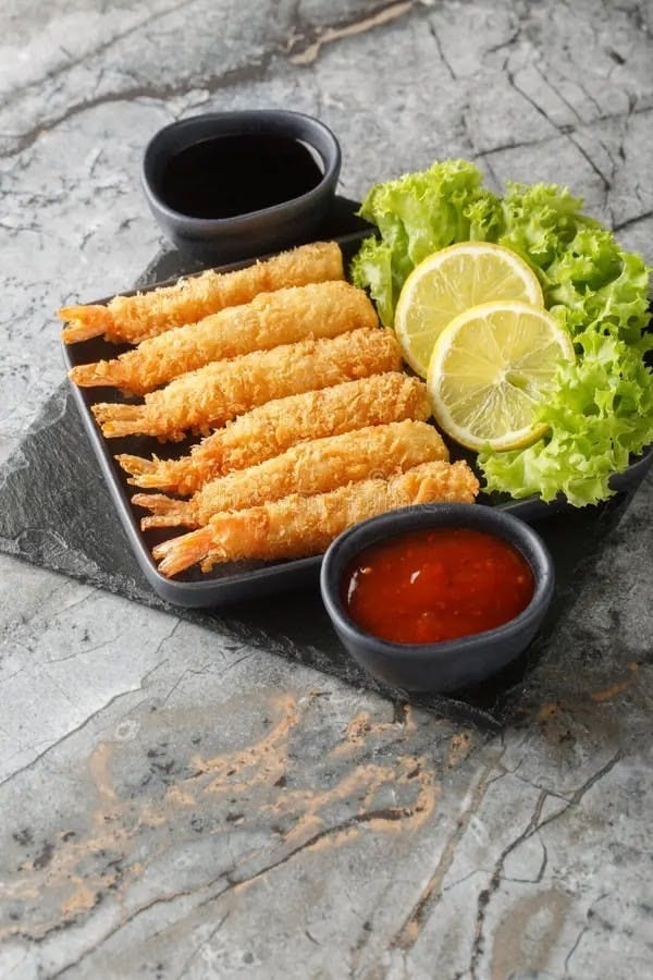 Panko Fried Shrimp Served with Hot Sauce.